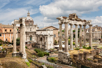 Fototapeta na wymiar View of the architectural monuments of ancient Rome in the Roman Forum. Rome, Italy