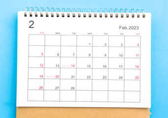 calendar February 2023 top view on a blue background