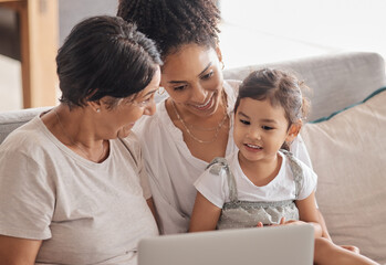 Children, family and laptop with a girl, mother and grandmother using the internet on a sofa in a living room. Adoption, foster care and love with a woman, daughter and child watching series together - obrazy, fototapety, plakaty