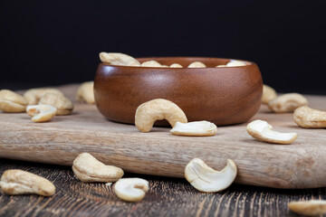 Peeled raw cashew nuts on the table