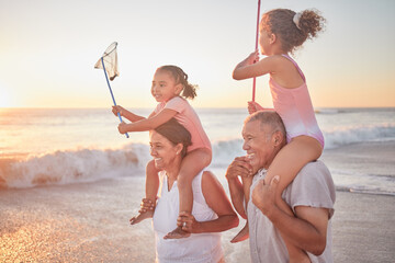 Children, grandparents and piggy back on beach on summer holiday walking in sea sand. Happy family...