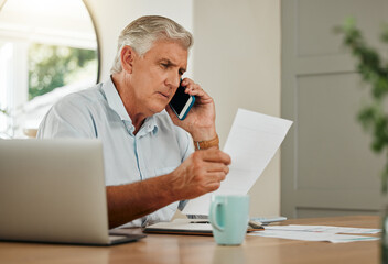 Senior man on a phone call with finance documents for debt counselling. Old male at home with his...