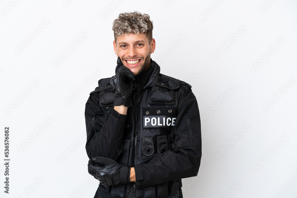 Wall mural SWAT caucasian man isolated on white background smiling