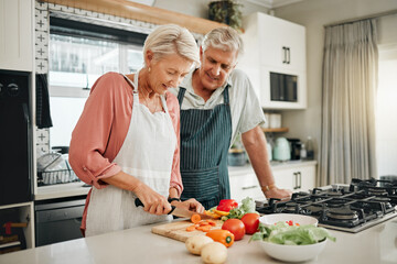 Senior couple, healthy food and cooking lunch together in Australia kitchen at home. Happy woman, hungry man and retirement people cut vegetables for nutrition diet, wellness and vegan dinner meal - obrazy, fototapety, plakaty