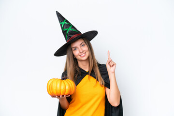 Young caucasian woman costume as witch holding a pumpkin isolated on white background showing and lifting a finger in sign of the best