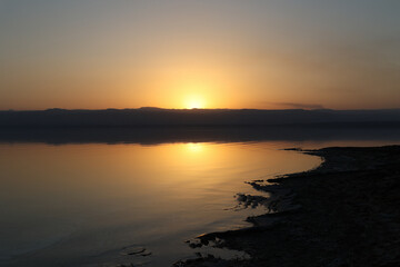 landscape view of coastline of dead sea at sunset