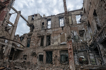 destroyed and burned houses in the city during the war in Ukraine