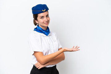 Airplane stewardess caucasian woman isolated on white background presenting an idea while looking smiling towards