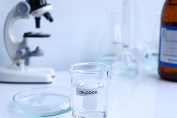 acetic acid in glass, chemical in the laboratory and industry