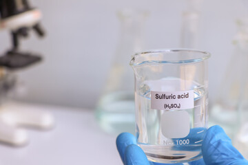 sulfuric acid in glass, chemical in the laboratory and industry