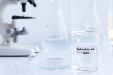 sodium hydroxide in glass, chemical in the laboratory and industry