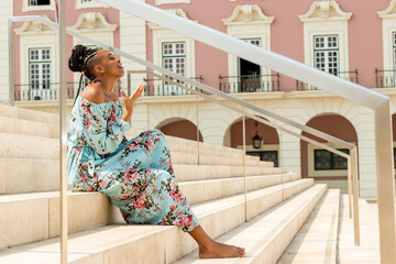 Photographing beautiful woman on stairs 