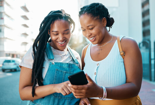 African woman friends with smartphone in urban city reading social media post, check location on digital app or internet search for youth lifestyle. Teenager couple on 5g cellphone chat or networking