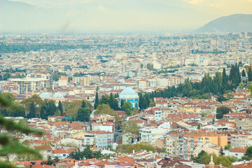 Green Tomb and mosque landscape in Bursa city. Touristic destination in Turkey. Bursa aerial view.