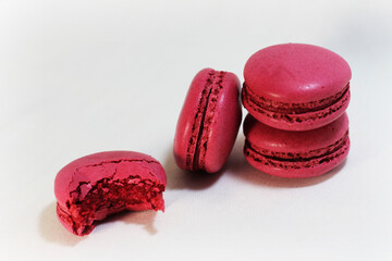 Pink macaroons on white background. Colorful macaroons