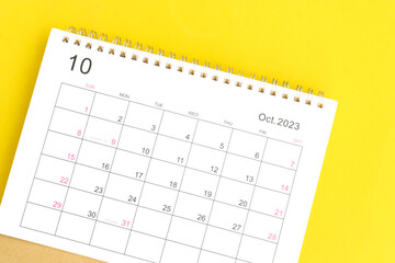 calendar October 2023 top view on yellow a background