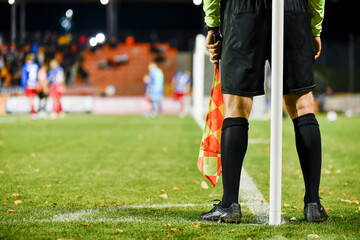Fototapeta premium Touchline referee's during soccer match.