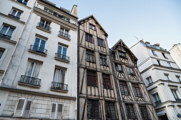 Fototapeta na wymiar Old medieval style timber framed house in Paris situated in the heart of Le Marais district in Paris, France
