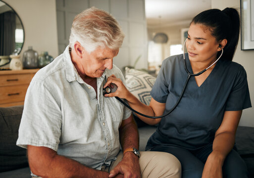 Healthcare, Senior Man And Woman Nurse With Stethoscope Checking Heart Rate At Retirement Home. Health, Care And Elderly Grandpa On Living Room Sofa With Lady Caregiver On Medical Visit Or House Call