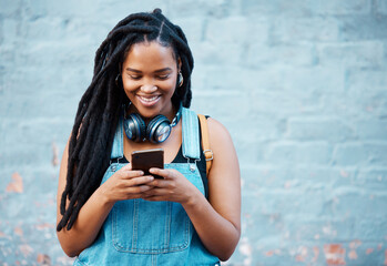 Black woman with 5g smartphone for social media typing, digital chat app or check location on blue...