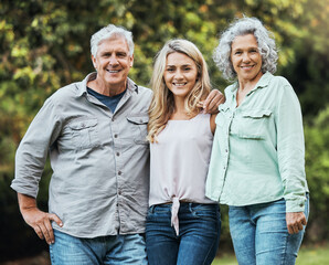 Portrait of mother, father and woman in park on hioliday in Australia together in summer. Happy,...