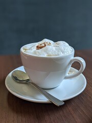 cup of cappuccino with chocolate