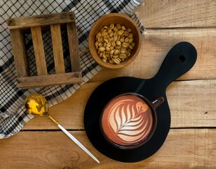 coffee and beans on wood background