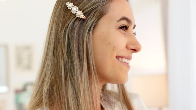 Woman, hair and jewelry look in mirror to check face, makeup and fashion to start day. Girl, beauty and happy look at style with smile for cosmetics, hair care and glow on skin while home in Paris