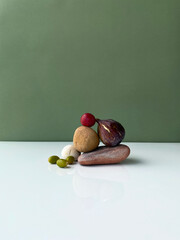 Still life with fruits and stones