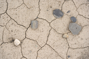 Obraz premium Dry soil with rocks