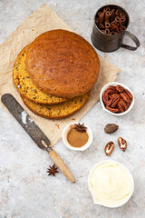Carrot cake and ingredients: pecans, cinnamon