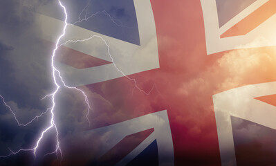 Dramatic stormy clouds with lightning next to UK flag. Upcoming crisis and economy problems in...