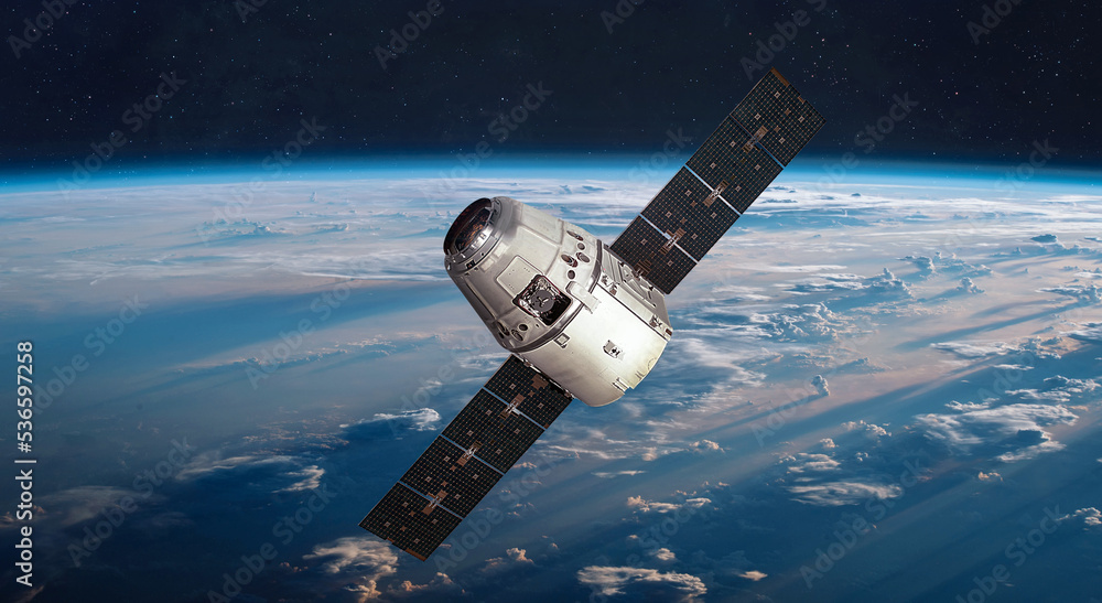 Wall mural spacecraft in space. spaceship on orbit of earth planet. expedition on space station. elements of th