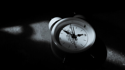 black and white photo of a clock