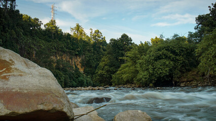 photo of a stream in the afternoon in Aceh Indonesia