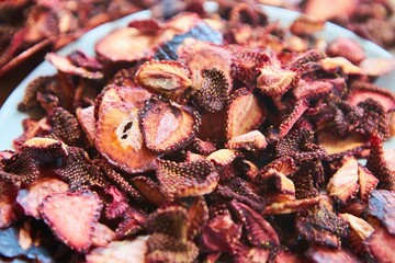 Dried sliced strawberries. Saving summer fruits for the future.