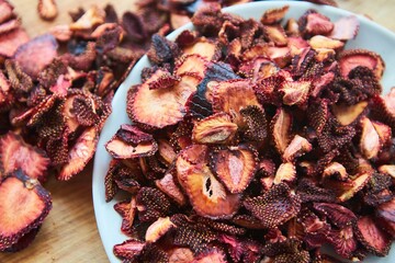 Dried sliced strawberries. Saving summer fruits for the future.