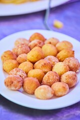 Deep-fried cheese balls. Fast food on the table.