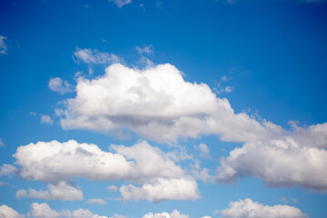 Naklejka na ściany i meble Beautiful clouds against the blue sky.