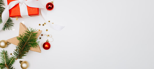 Spruce branches, red box and Christmas balls