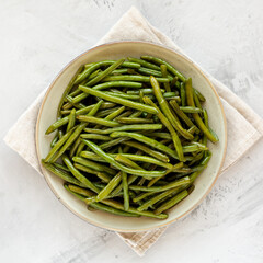 Homemade Sauteed Green Beans on a Plate, top view. Flat lay, overhead, from above.