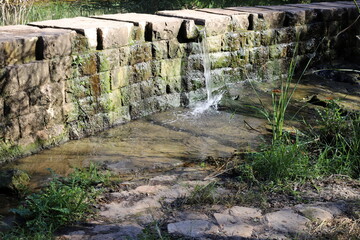 High wall made of stone and concrete.