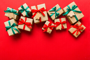 wrapped christmas or other holiday handmade present in paper with colored ribbon. Present box,...