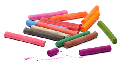 a set of multi-colored dry pastels on a white background