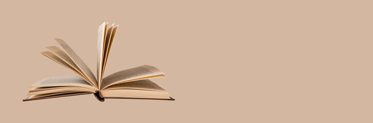 Book with turning pages. Library banner with copy space for ad text