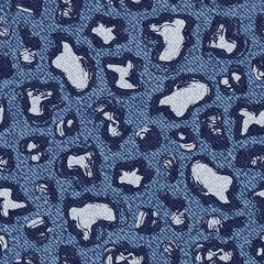 Spotted Jeans background. Vector Denim Leopard Seamless Pattern. Blue jeans cloth. Grunge brush strokes Spots. © AllNikArt