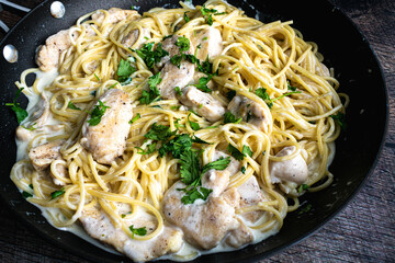 Creamy Cilantro-Lime Chicken Pasta in a Skillet: Spaghetti and chicken breast in a creamy cilantro and lime sauce