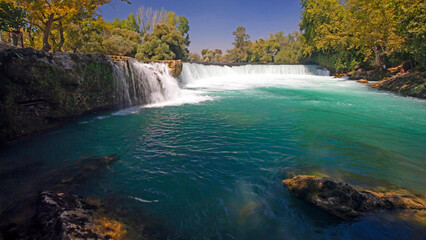 Manavgat Waterfall inTurkey. Antalya, Turkey. Blue green nature background.