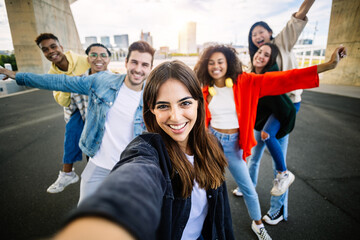 Multiracial young group of trendy people having fun together on vacation - Diverse millennial...