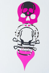 esoteric overlapping skull heads design on blank paper